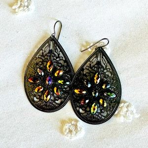 Iridescent and black statement earrings